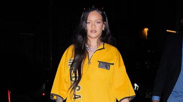 Rihanna’s Hair Looks Longer Than Ever As She Rocks Oversized Yellow Jersey & Dior Bag In NYC