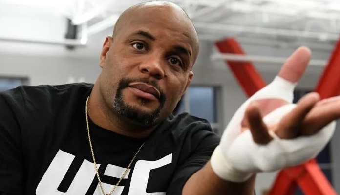 Daniel Cormier reacts after being booked as guest referee for Seth Rollins vs. Matt Riddle at WWE’s Extreme Rules: “The law has been called in, and I will enforce it”