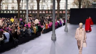 Glitzy Valentino show sees Paris Fashion Week at fever pitch