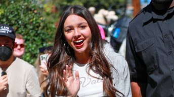 Olivia Rodrigo Channels Britney Spears’ ‘Baby One More Time’ Schoolgirl Look At Fan Event: Photos