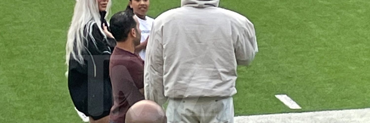 Kim Kardashian and Kanye West Attend Saint’s Football Game, Chat on Sidelines