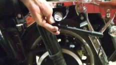 Motorcycle Repair: Adjusting the Rear Suspension Air System Shocks on a Harley Davidson