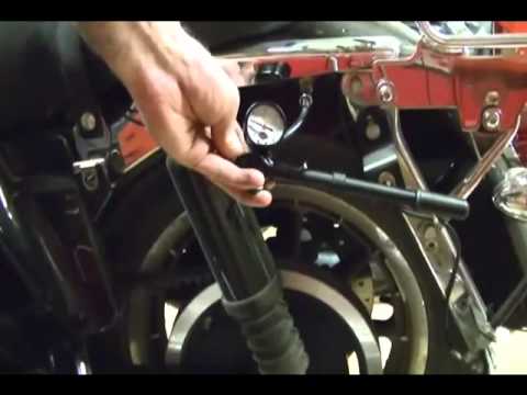 Motorcycle Repair: Adjusting the Rear Suspension Air System Shocks on a Harley Davidson