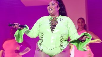 Lizzo Is ‘100% That Grinch’ in Festive Bondage Outfit