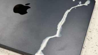 Bah, humbug! MacBook Air’s midnight finish was no match for a toy air hockey table