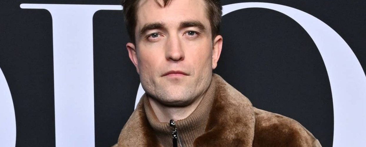 Robert Pattinson Wore A Skirt And A Brown Fleece To Paris Fashion Week, And It Sure Is Something