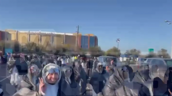 Possible Backup Dancers for Rihanna’s Halftime Show Trek Across Parking Lot