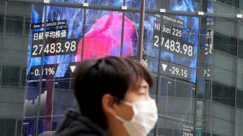 World shares mostly higher as inflation worries dog Wall St