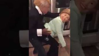 Mediatakeout African American couple dressed up as Donald and Hillary dancing to jamaican music