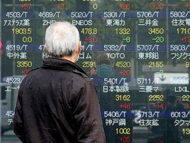 Asia stocks follow Wall St down after US recession warning