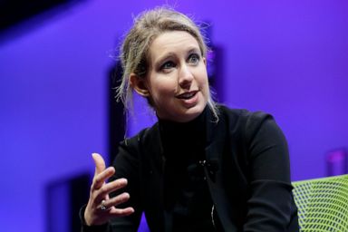 As Elizabeth Holmes heads to prison for fraud, many puzzle over her motives