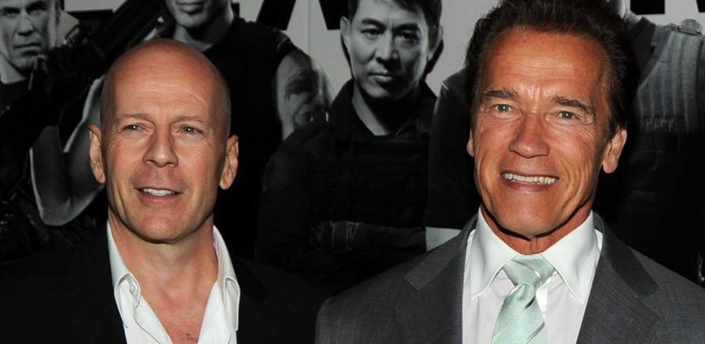 Arnold Schwarzenegger on Bruce Willis’ Retirement: Action Stars “Never Really Retire … They Reload”