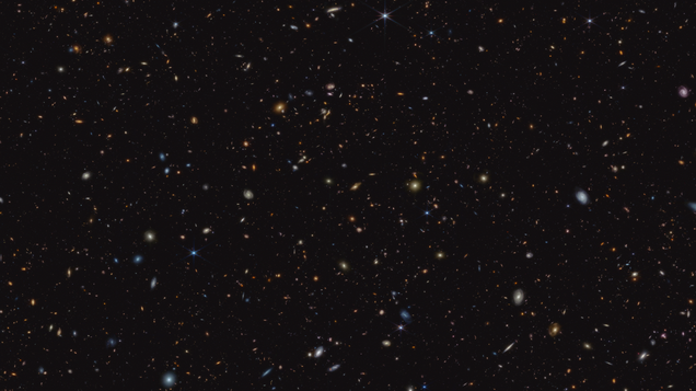 New Webb Image Reveals 45,000 Sparkling Galaxies in Ancient Star Formation