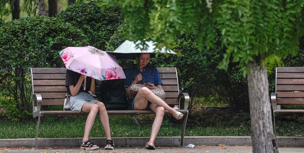 Beijing orders outdoor work to be halted as scorching summer heat soars