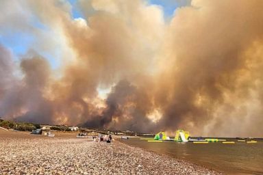 2,000 people including tourists evacuated as a wildfire rages on the Greek island of Rhodes