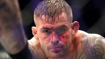 Dustin Poirier reacts following knockout loss to Justin Gaethje at UFC 291