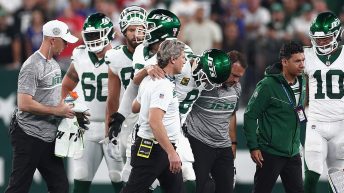 Aaron Rodgers Carried Off Field With Injury During First Career Jets Drive