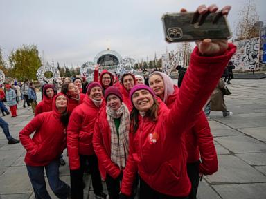 Russia opens a vast national exposition as presidential election approaches