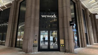 WeWork seeks bankruptcy protection in stunning fall for a company once valued close to $50 billion