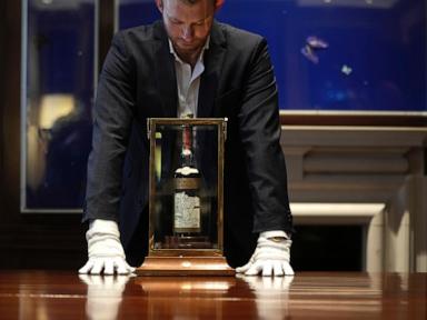 Cheers! Bottle of Scotch whisky sells for a record $2.7 million at auction