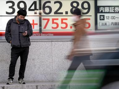 Stock market today: Asian shares are mixed after Bank of Japan ups key rate for 1st time in 17 years