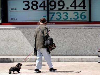 Stock market today: Asian shares track Wall Street slump triggered by strong US spending data