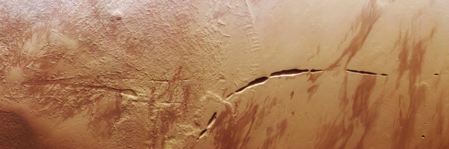 Mars-Orbiting Spacecraft Captures ‘Snaking Scar’ Across the Base of Enormous Volcano