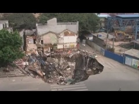 Sinkhole swallows whole building complex in China