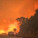 Thousands flee out-of-control wildfires in California and Nevada