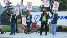 Workers who assemble Boeing planes are on strike. Will that affect flights?